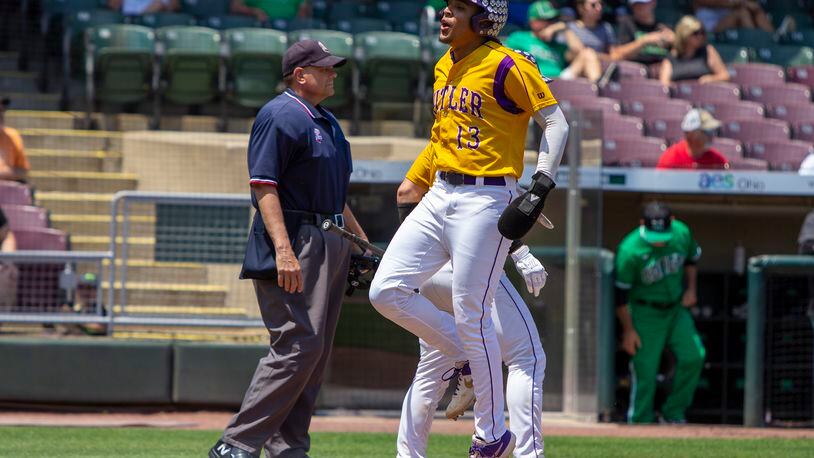 Vandalia Butler's Quinton Hall scores the Aviators' first run in the first inning against Mason. Hall reached on an error and scored on Carson Clark's double in Friday's Division I regional semifinal at Day Air Ballpark. Jeff Gilbert/CONTRIBUTED