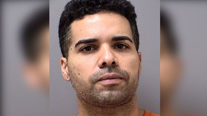 Carlos Suarez-Diaz is facing drug trafficking charges after deputies discovered a massive marijuana grow operation in his home, valued at over $1.2 million.