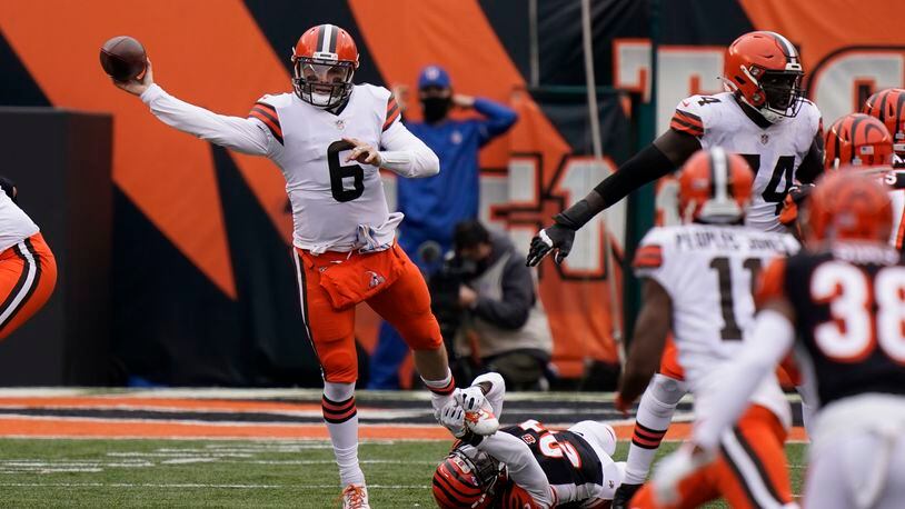 Cleveland Browns quarterback Baker Mayfield (6) throws during the second half of an NFL football game against the Cincinnati Bengals, Sunday, Oct. 25, 2020, in Cincinnati. (AP Photo/Bryan Woolston)