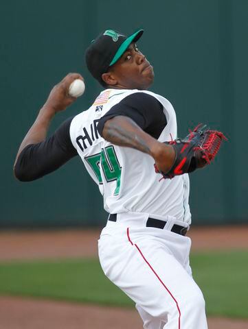 Reds Chapman Pitches for Dragons