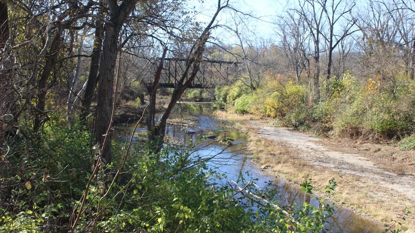 Wolf Creek near Wesleyan MetroPark in northwest Dayton. Dayton is seeking a company to complete a stream restoration project for the creek. CORNELIUS FROLIK / STAFF