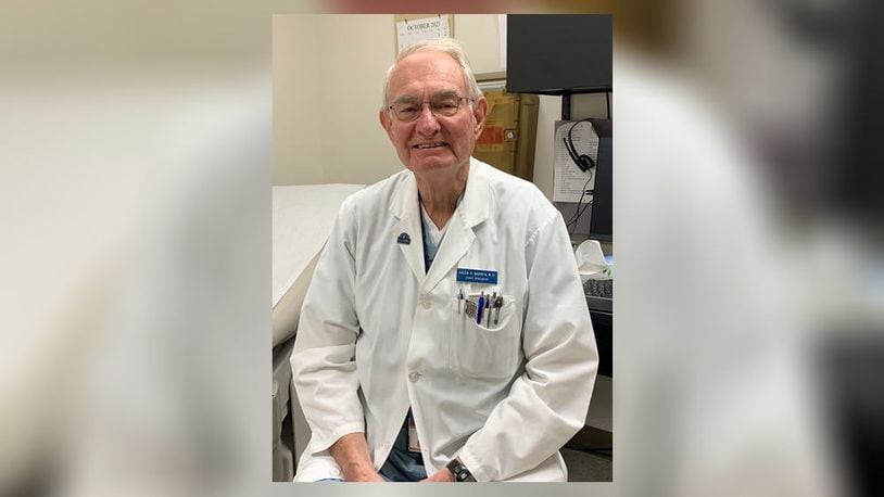 Dr. Galen Warren, 80, came out of retirement six years ago to work part-time at Dayton's VA Medical Center. AIMEE HANCOCK / STAFF