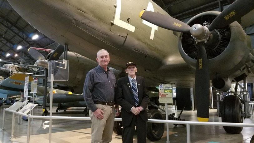 Air Force Research Laboratory Aerospace Systems Directorate employee Kevin Price (left) and World War II veteran Jim ‘Pee Wee’ Martin are pictured in front of the C-47 aircraft displayed at the National Museum of the United States Air Force on Aug. 30. Price will accompany the 98-year-old Martin in September as he travels to the Netherlands to parachute into the region he helped liberate 75 years ago as part of Operation Market Garden. (U.S. Air Force photo/Holly Jordan)