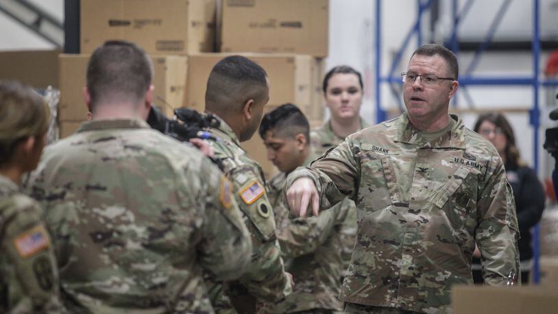 Col. Daniel Shank, Ohio assistant adjutant general for Army, visited Soldiers of the Ohio Army National Guard Friday, March 27, 2020, who are assisting The Foodbank Inc. JIM NOELKER/STAFF