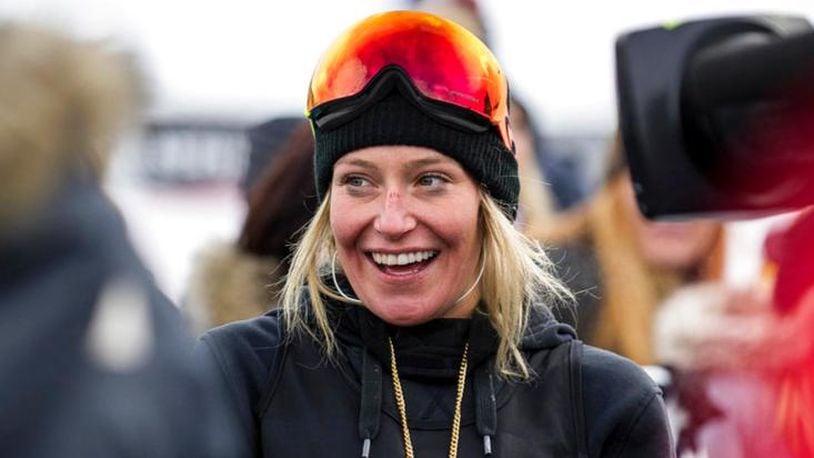 Snowboard slopestyle gold medalist Jamie Anderson smiles at the Winter X Games, Friday, Jan. 26, 2018, iN Aspen, Colo. (Anna Stonehouse/The Aspen Times via AP)