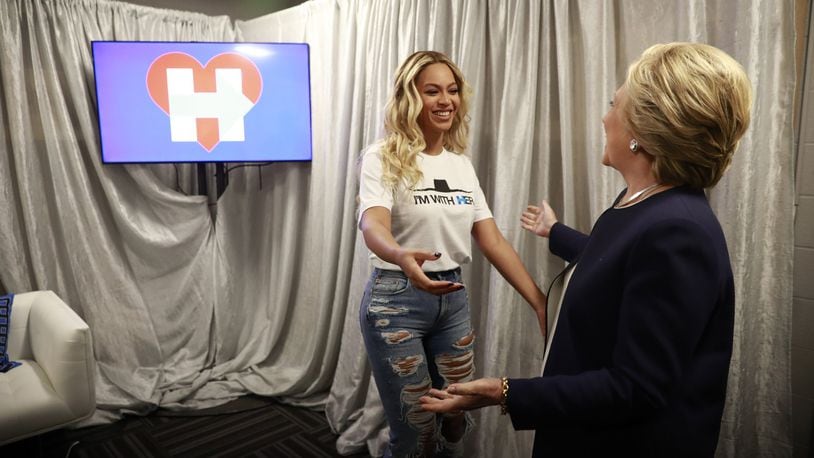 Hillary Clinton greets Beyonce before a campaign event and performance at Cleveland State University in Cleveland, Nov. 4, 2016. (Doug Mills/The New York Times)