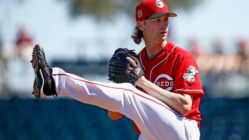 Cincinnati Reds starting pitcher Bronson Arroyo winds up to throw a pitch against the Milwaukee Brewers during the second inning of a spring training baseball game Sunday, March 12, 2017, in Goodyear, Ariz. The Reds defeated the Brewers 4-2. (AP Photo/Ross D. Franklin)