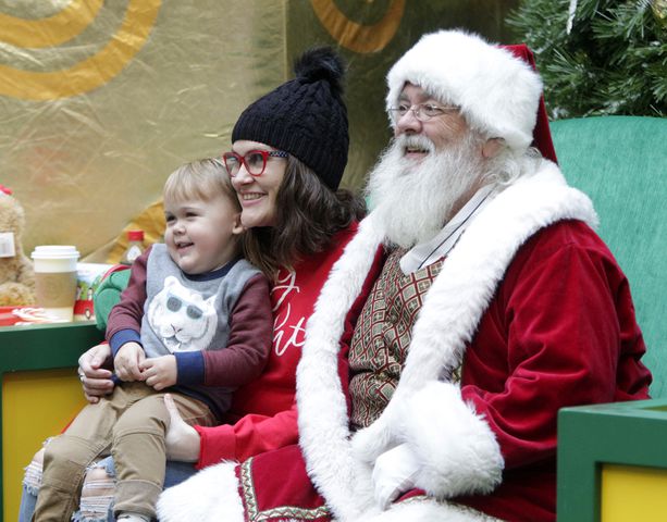 PHOTOS: A visit with Santa Claus makes the holiday season magical