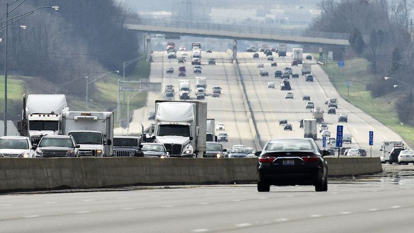 Holiday travel will break records, but roadways may not be as congested. NICK GRAHAM/STAFF