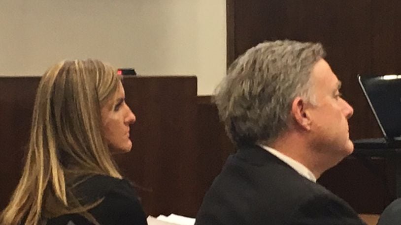 Jessica Langford sits with defense attorney Lawrence Greger during the first day of her trial. NICK BLIZZARD/STAFF