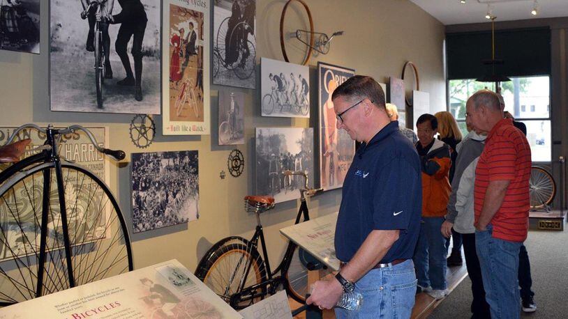 Col. Charles Ormsby, acting director, Air Force Research Laboratory Materials and Manufacturing Directorate, views displays at the site of the original Wright Brothers’ Bicycle Shop in downtown Dayton Sept. 13. Ormsby accompanied a group of military and civilian scientists, staff and engineers from the directorate on a visit to significant aviation history sites across Dayton during an Aviation Heritage Tour to gain a better understanding of the evolution of innovation in Dayton, the legacy of which the AFRL carries on today. (U.S. Air Force photo/Marisa Alia-Novobilski)