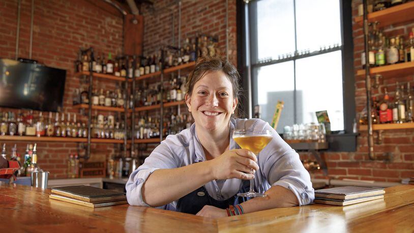 Chef Sara Bradley of the freight house curates a farm-to-table dining experience and bar featuring handcrafted cocktail drinks and a staggering collection of Kentucky bourbon. (the freight house)