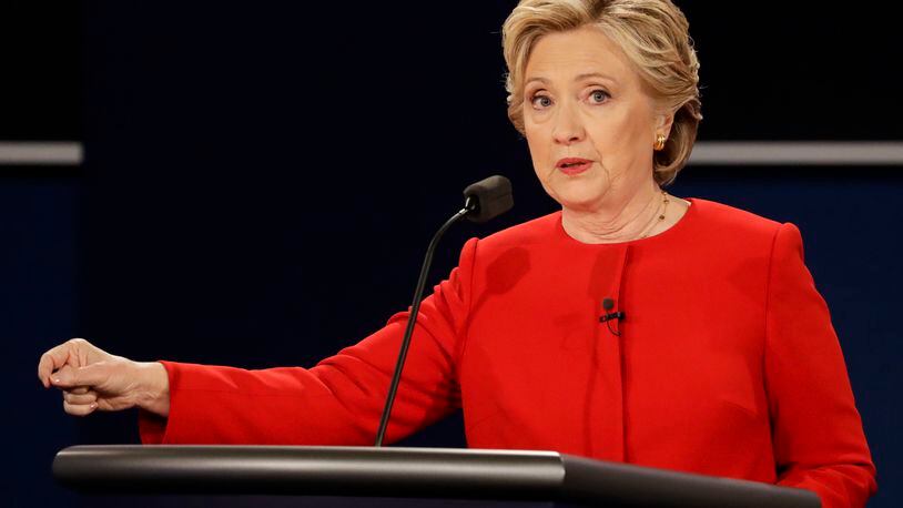 Democratic presidential nominee Hillary Clinton answers a question during the presidential debate with Republican presidential nominee Donald Trump at Hofstra University in Hempstead, N.Y., Monday, Sept. 26, 2016. (AP Photo/David Goldman)