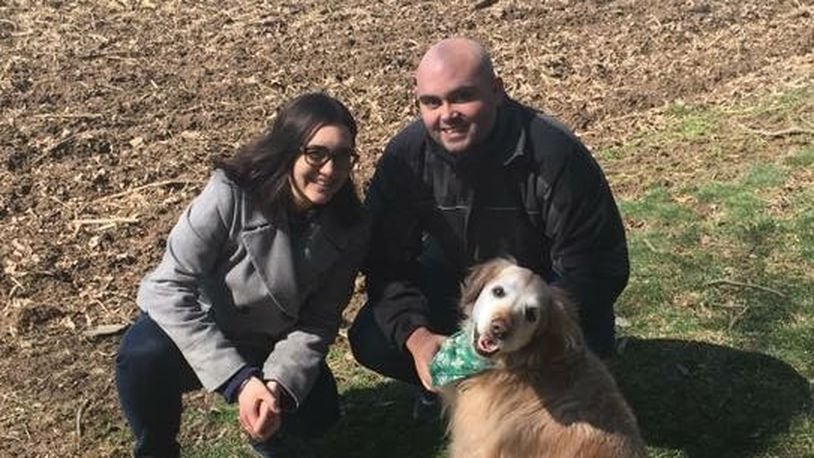NewsCenter 7's James Buechele poses for a photo with dog, Carson, and sister, Liz.
