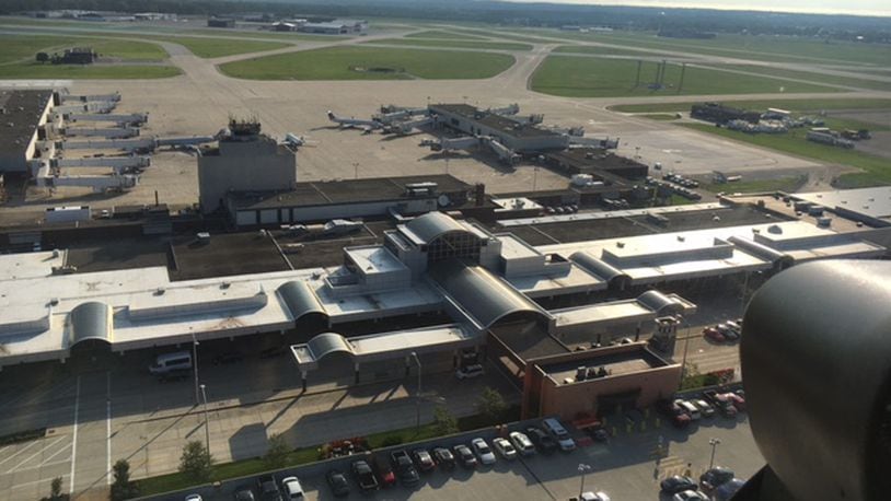 A view of the Dayton International Airport terminal, with runways behind, from a helicopter flight in August 2016. THOMAS GNAU/STAFF