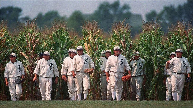 In this June 22, 1997 photo, people portraying ghost players emerge from a cornfield as they reenact a scene from the movie "Field of Dreams" at the movie site in Dyersville, Iowa.