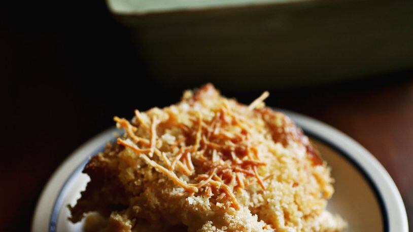 This Beer-baked Macaroni and Cheese is adapted from the Rackhouse Pub in Denver. With two sticks of butter, two cups of half-and-half and five different cheeses, it is over-the-top good. (Juli Leonard/Raleigh News & Observer/TNS)