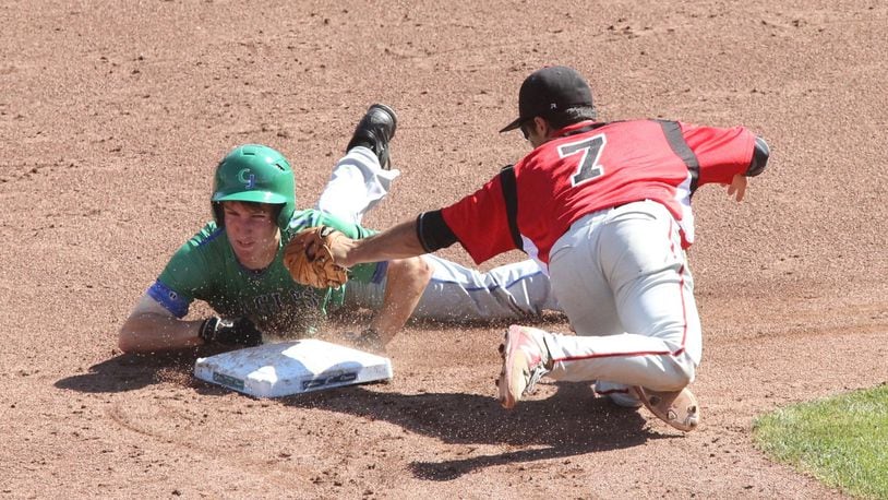 Chaminade Julienne’s Mark Barhorst steals second base ahead of a tag by Steubenville’s Gino Pierro in a Division II state semifinal on Thursday, June 1, 2017, at Huntington Park in Columbus. David Jablonski/Staff