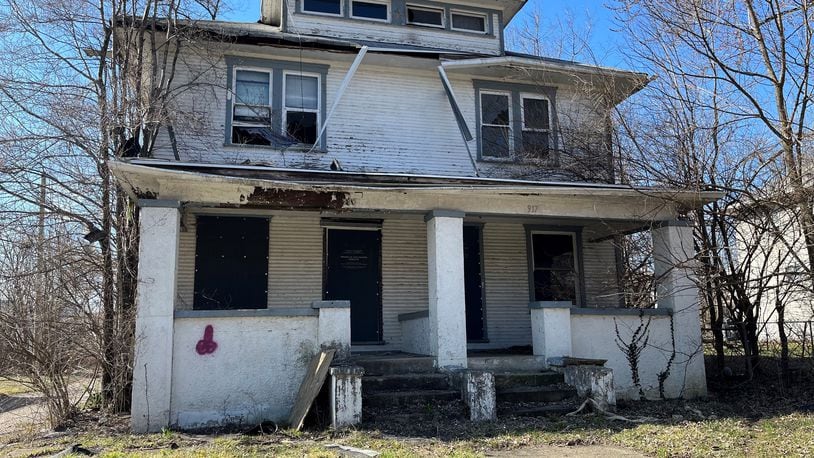 This property on the 900 block of North Euclid Avenue in Dayton owes more than $72,000 in delinquent taxes. CORNELIUS FROLIK / STAFF