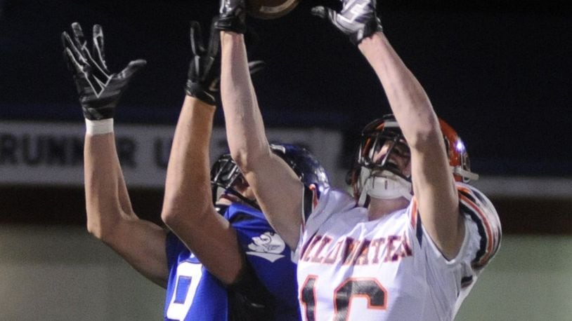 Neal Muhlenkamp of Coldwater (right) was chosen a Division V first-team All-Ohio receiver. MARC PENDLETON / STAFF