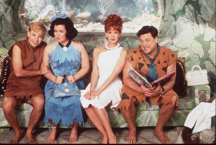Betty and Wilma and Fred and Barney from "The Flintstones"