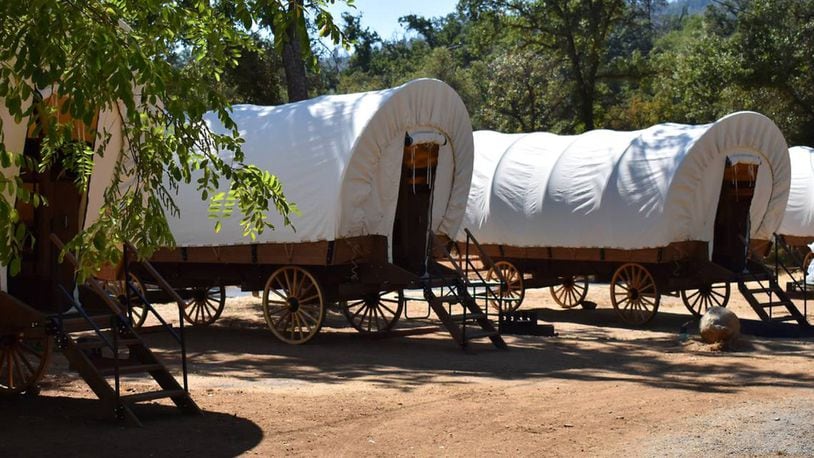 Yosemite Pines Resort in Groveland, California, 22 miles from the western gate of Yosemite National Park, has six Conestoga Wagons that people can glamp in. The wagons are air-conditioned and roomier than the ones pioneers traveled in. ( Courtesy Yosemite Pines Resort)
