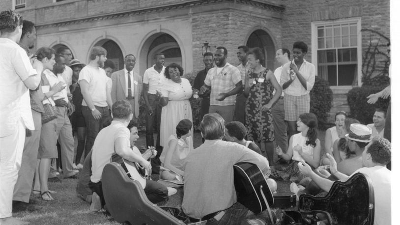 Volunteers sing freedom songs on the lawn in front of Clawson Hall at Western College (now Miami University) in 1964. Miami will be hosting additional events next week to commemorate the historic summer. George R. Hoxie/Smith Library of Regional History