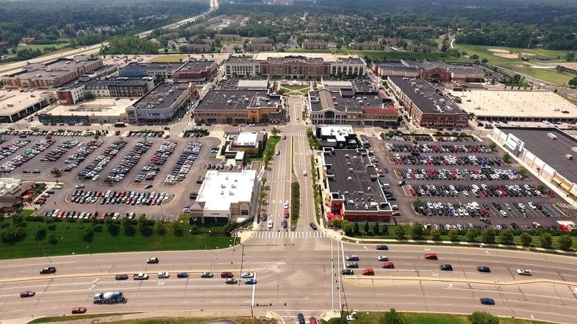 The Greene Town Center in Beavercreek opened in 2006 and is now boasting more than 100 shops and restaurants in the mixed retail open shopping center.  TY GREENLEES / STAFF
