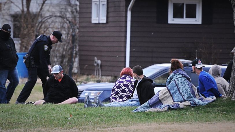 Multiple people have been detained after police executed a drug-related search warrant at a house on Pittsfield Street in Kettering Monday morning. Photo by Marshall Gorby