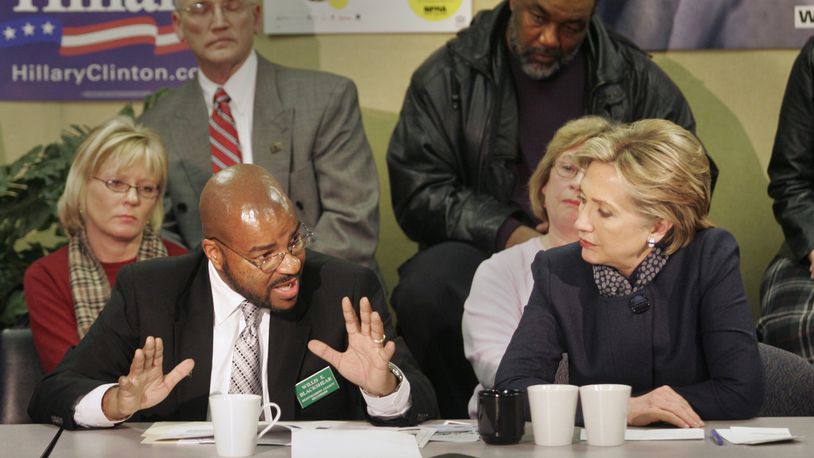 Montgomery County Recorder Willis Blackshear tells Democratic presidential candidate Sen. Hillary Clinton about the issue of local housing foreclosures as she brought her campaign to the Miami Valley in 2008, meeting with local people caught in the crisis. Staff photo by Chris Stewart