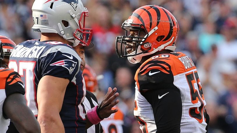 FOXBORO, MA - OCTOBER 16: Rob Gronkowski #87 of the New England Patriots and Vontaze Burfict #55 of the Cincinnati Bengals exchange words in the fourth quarter at Gillette Stadium on October 16, 2016 in Foxboro, Massachusetts.(Photo by Jim Rogash/Getty Images)