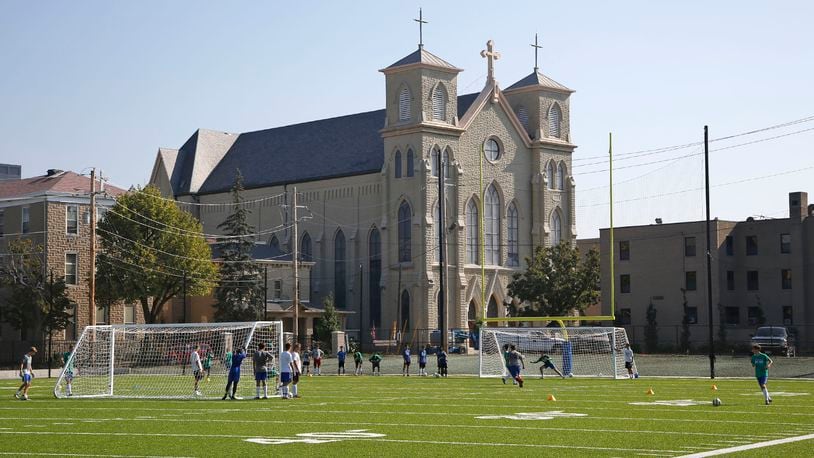 The Chaminade Julienne soccer team practices on the school's Eagle Field next to Roger Glass Stadium. Hundreds of CJ students attend the school with the benefit of EdChoice vouchers from the state.  FILE PHOTO