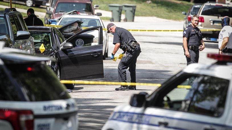 Dayton police investigate a shooting that injured a man at West Hillcrest Avenue and Mayfair Road on Monday, Aug. 24, 2020. STAFF PHOTO / MARSHALL GORBY