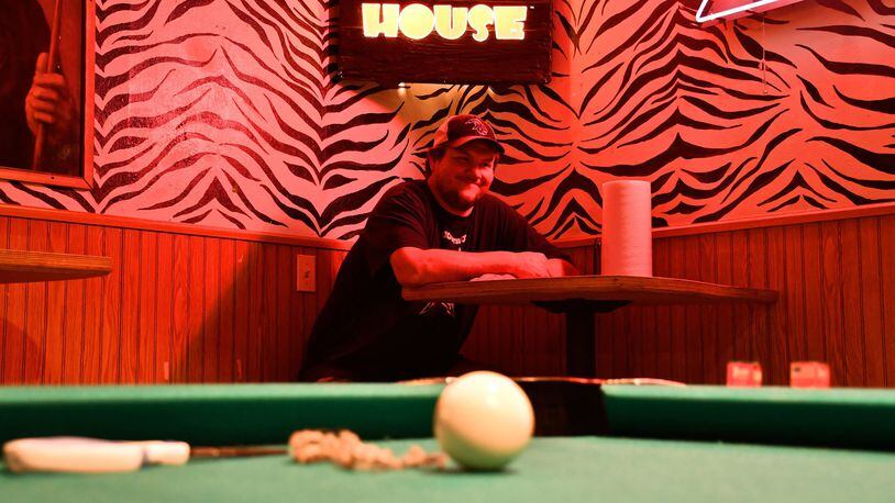 Rattlesnake BBQ owner Dustin Holmes, at the Rattlesnake BBQ Dexter Lake Club near Eugene, Ore., where the “Animal House” club scene was shot. (Christopher Reynolds/Los Angeles Times/TNS)