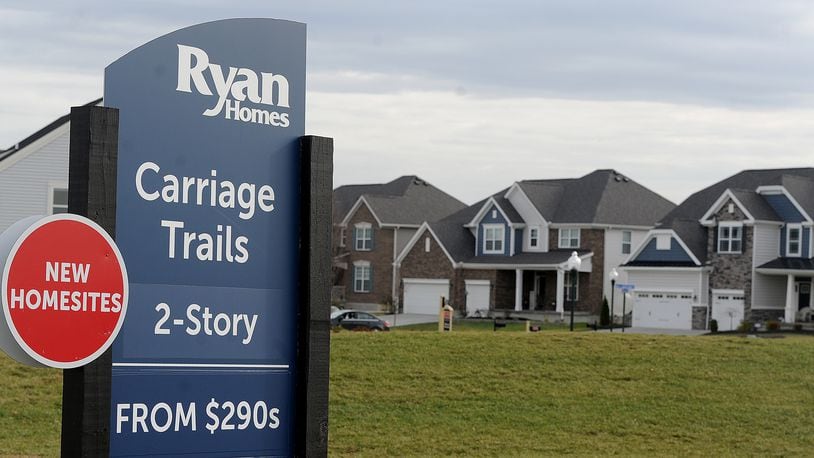 Carriage Trails is one of Huber Heights' largest housing developments, sitting on the border of Montgomery and Miami counties. MARSHALL GORBY\STAFF