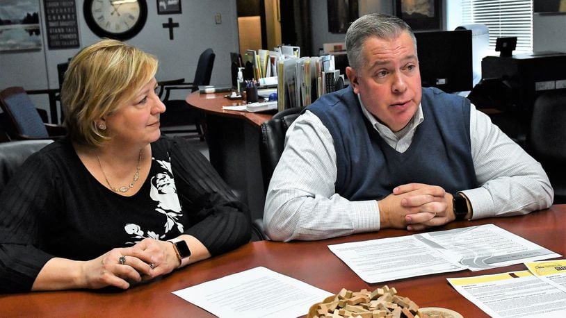 Shelly Calvert and Bob Lybarger discuss efforts at Isaiah s Place to recruit foster care families and provide enhanced training from the nonprofit organization’s Troy headquarters. CONTRIBUTED