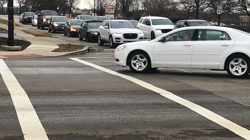 New traffic signals will be installed at the intersection of Ohio 48 and Spring Valley Pike in Centerviille, allowing drivers to make protected left turns in all four directions, according to the city. NICK BLIZZARD/STAFF