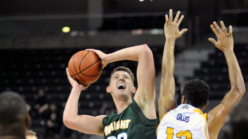 Wright State sophomore forward Parker Ernsthausen puts up a shot against Northern Kentucky sophomore forward Brennan Gillis on Tuesday night at BB&T Arena. Jay Morrison/Staff
