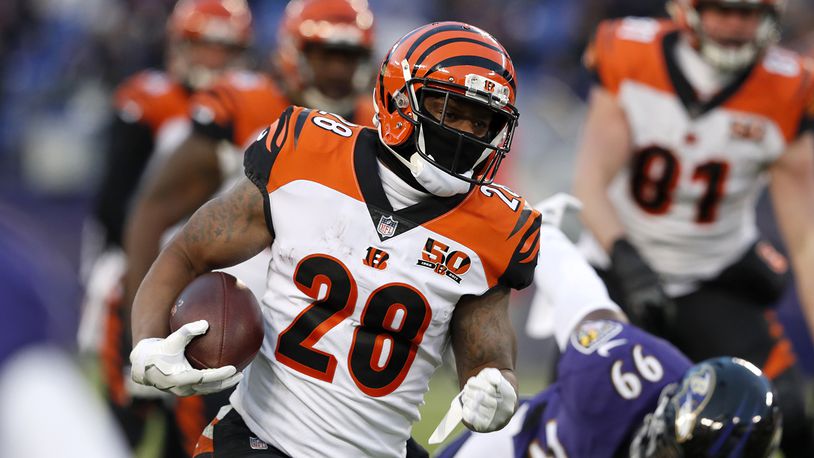 BALTIMORE, MD - DECEMBER 31: Running Back Joe Mixon #28 of the Cincinnati Bengals carries the ball in the first quarter against the Baltimore Ravens at M&T Bank Stadium on December 31, 2017 in Baltimore, Maryland. (Photo by Todd Olszewski/Getty Images)