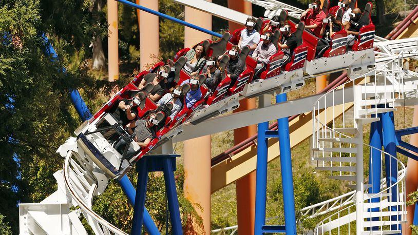 Samsung is a sponsor of the New Revolution at Six Flags Magic Mountain, a roller coaster that puts virtual reality goggles on riders so they can get a sensation of flying through space. (Al Seib/Los Angeles Times/TNS)