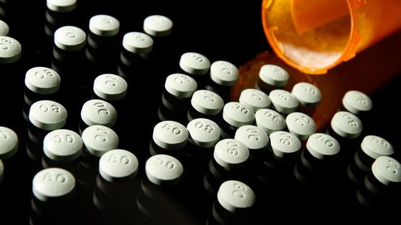 Drugs such as morphine, fentanyl, and oxycodone are such powerful analgesics because they so effectively block pain signals by acting directly on the brain. OxyContin, in 80 mg pills, in a 2013 file image. (Liz O. Baylen/Los Angeles Times/TNS)