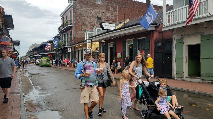 Jon Centella, 36, a sales director from Memphis, walks down Bourbon St. on a recent weekend with his family. (Jenny Jarvie/Los Angeles Times/TNS)