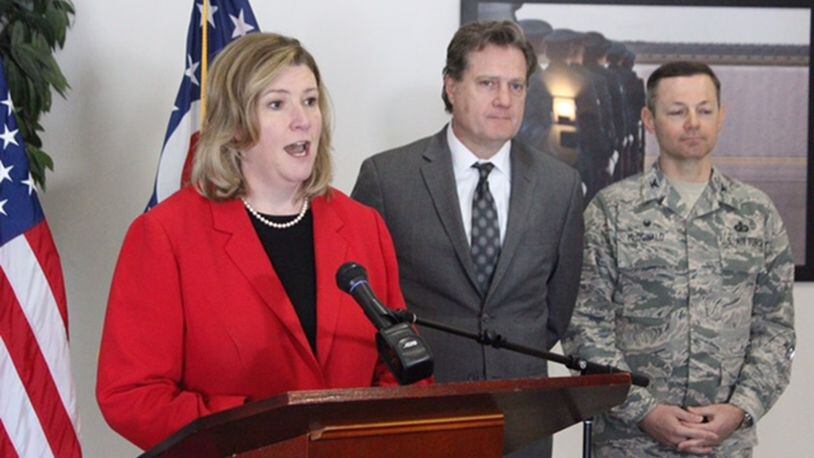 Dayton Mayor Nan Whaley, U.S. Rep. Mike Turne, R-Dayton, and Wright-Patterson Air Force Base installation commander Col. Bradley McDonald spoke Monday at a news conference insde the Hope Hotel and Conference Center in Fairborn, giving an update about water issues near Wright-Patterson. CHUCK HAMLIN/STAFF