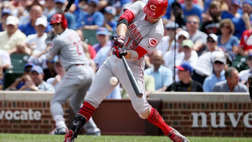CHICAGO, IL - AUGUST 17: Joey Votto #19 of the Cincinnati Reds hits a home run in the second inning against the Chicago Cubs at Wrigley Field on August 17, 2017 in Chicago, Illinois. (Photo by Dylan Buell/Getty Images)