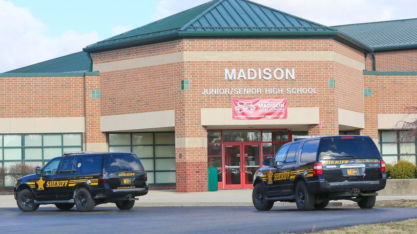 Some parents and residents in the Madison school system in Butler County have sued the district over the school board’s policy plan to arm school staffers. The district was the site of a 2016 student shooting that wounded four students. STAFF FILE/2016