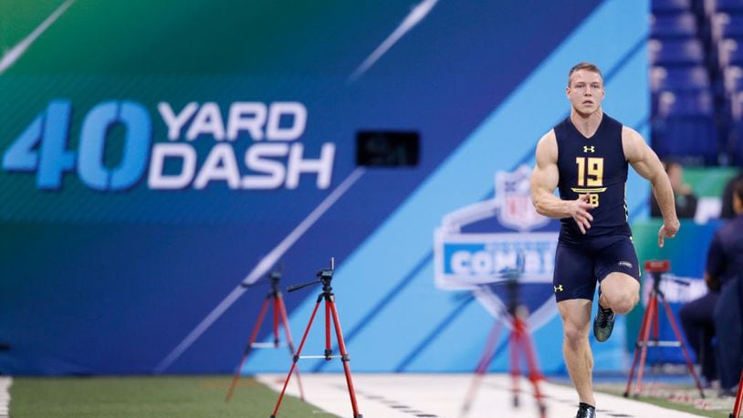 INDIANAPOLIS, IN - MARCH 03: Running back Christian McCaffrey of Stanford runs the 40-yard dash during the NFL Combine at Lucas Oil Stadium on March 3, 2017 in Indianapolis, Indiana. (Photo by Joe Robbins/Getty Images)