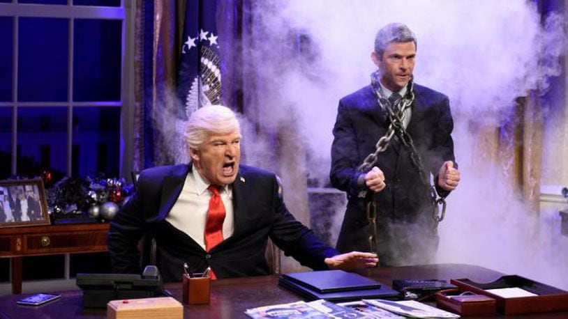 SATURDAY NIGHT LIVE -- Episode 1732 -- Pictured: (l-r) Alec Baldwin as President Donald J. Trump, Mikey Day as Michael Flynn during "White House Cold Open" in Studio 8H on Saturday, December 2, 2017 -- (Photo by: Will Heath/NBC/NBCU Photo Bank via Getty Images)