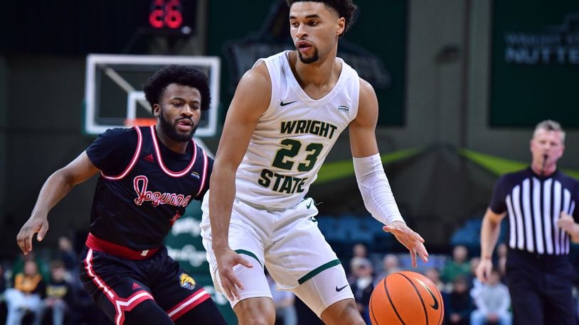 Wright State's Tanner Holden looks to score vs. IUPUI's Bryce Monroe during their game at the Nutter Center on Nov. 29, 2023. Wright State Athletics photo