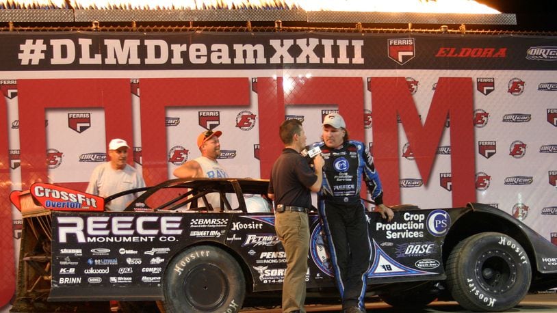 Tennessee’s Scott Bloomquist celebrates on Eldora Speedway’s victory lane stage after winning his record-extending seventh $100,000 Dirt Late Model Dream on Saturday. Contributed photo / Greg Billing