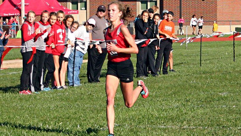 Morgan Gigandet led Troy’s sweep of the top three spots in the Miami County championship meet Saturday. GREG BILLING / CONTRIBUTED